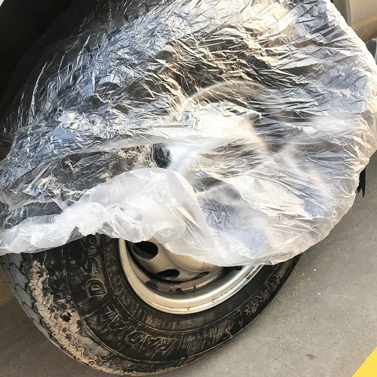 Penutup pelindung plastik ban sekali pakai mobil antianjing Salah semprot urin cat tas transparan penutup universal 40