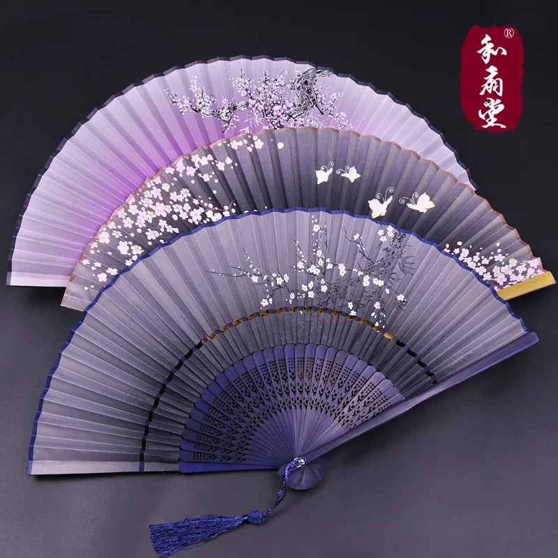 |And hall fans in Japanese fan gift of two Chinese women's silk fan section antique jump dance, little fan