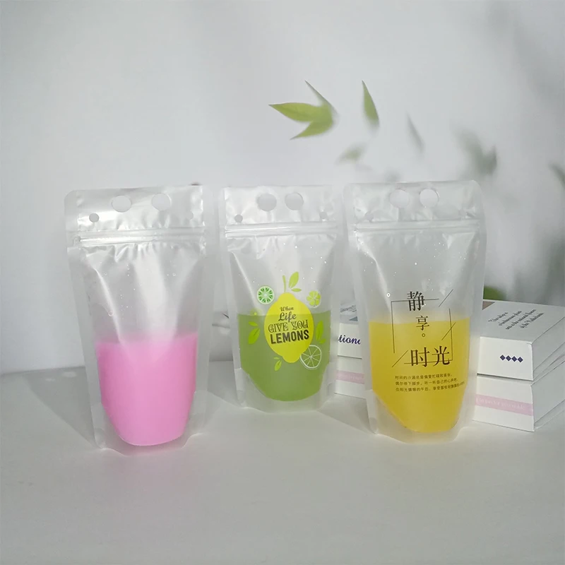 100pcs Creative frosted transparent disposable milk tea bag packaging coffee juice bubble tea plastic bags with handle 500ml