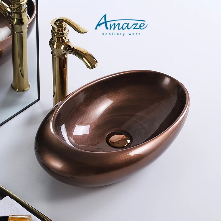 Competitive price copper color antique oval ceramic above counter top bathroom sink wc hand wash art basin for dining room