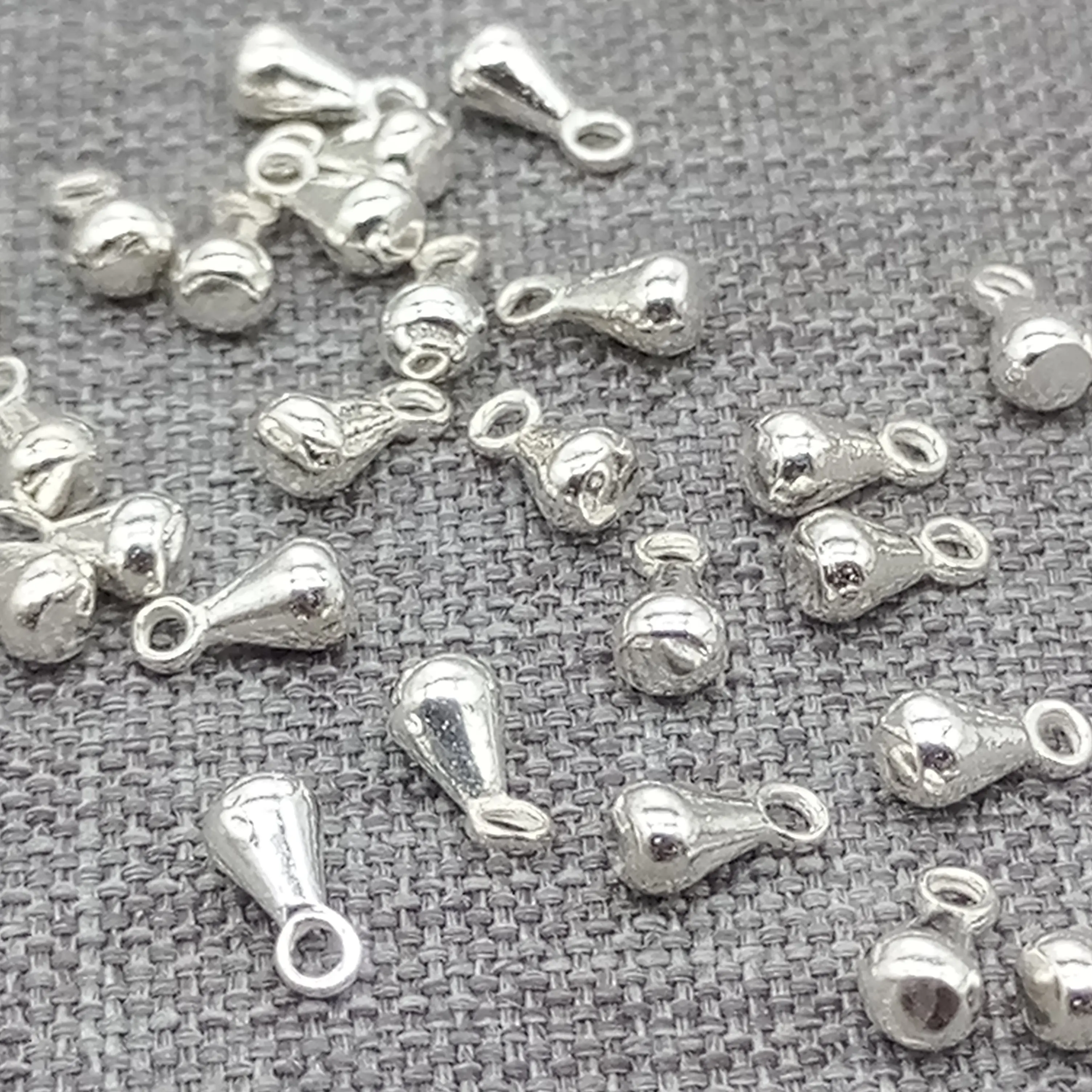 

15 Pieces of 925 Sterling Silver Tiny Water Drop Charm for Extension Chains Extender