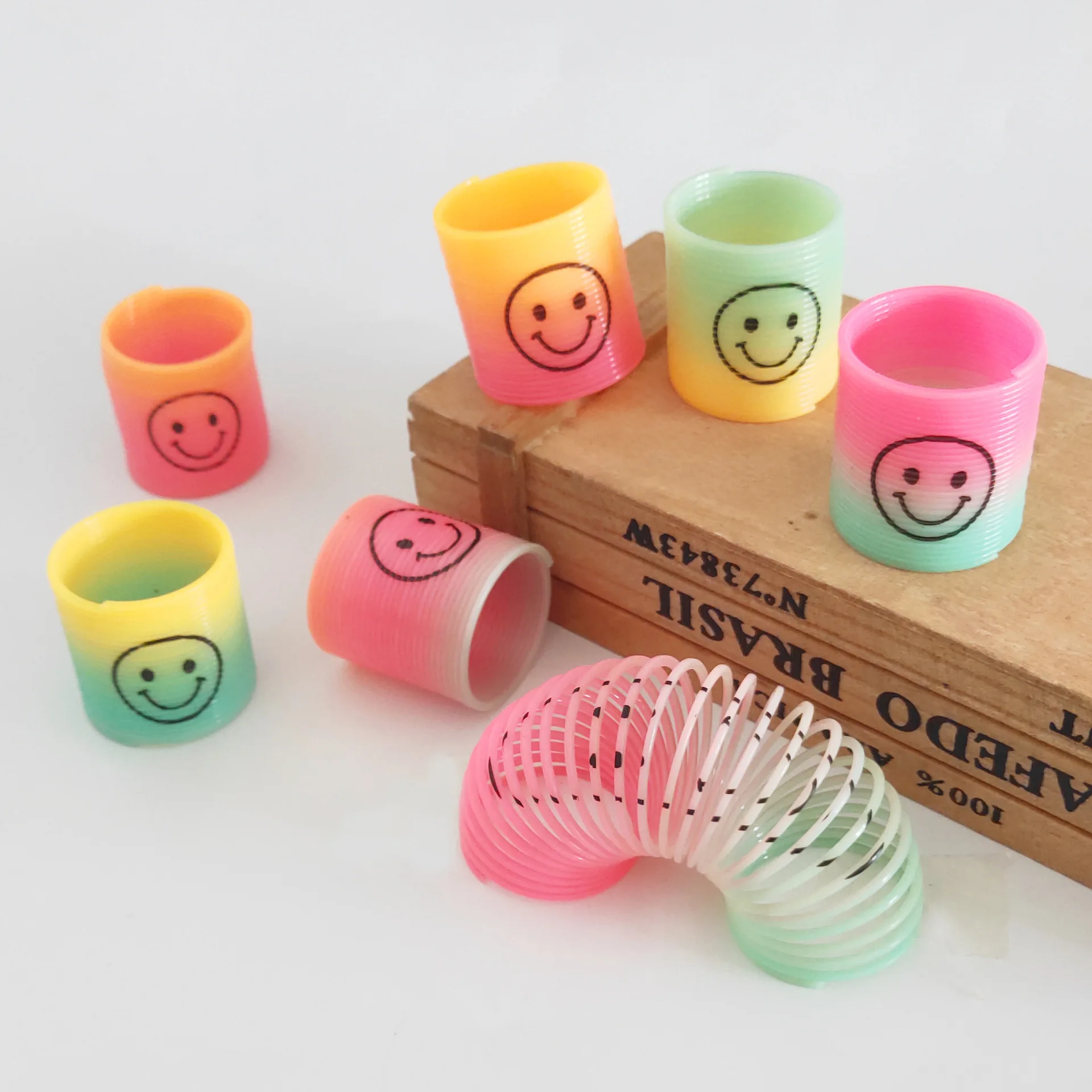 

12Pcs Cute Smile Face Spiral Game Rainbow Crazy Spring Toy Outdoor Funny Kids Party Favors Toy Gift Prize Goodies Pinata Fillers