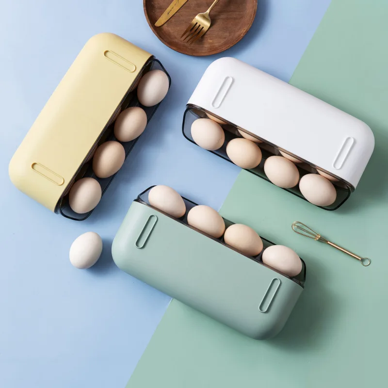 

The kitchen slide egg storage box tilts and overlaps the open plastic food storage box to get out of the egg box.