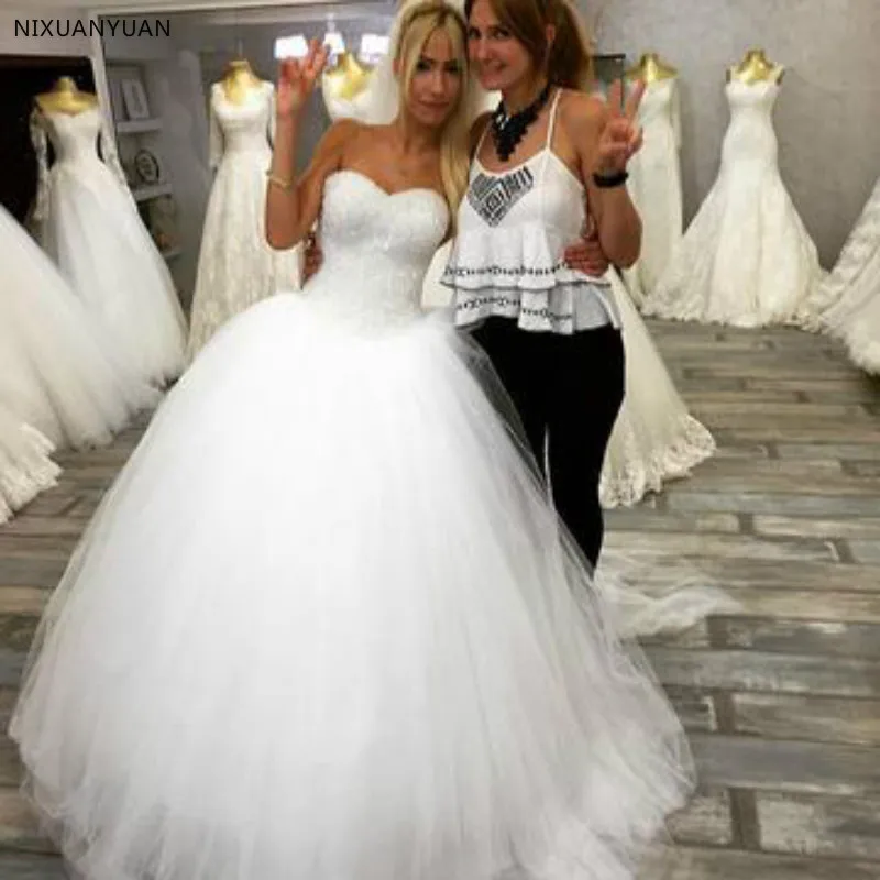 

Strapless White Tulle Bling Bling Sequins Beaded Sweetheart Puffy Ball Gowns Wedding Dresses Long Bridal Dresses