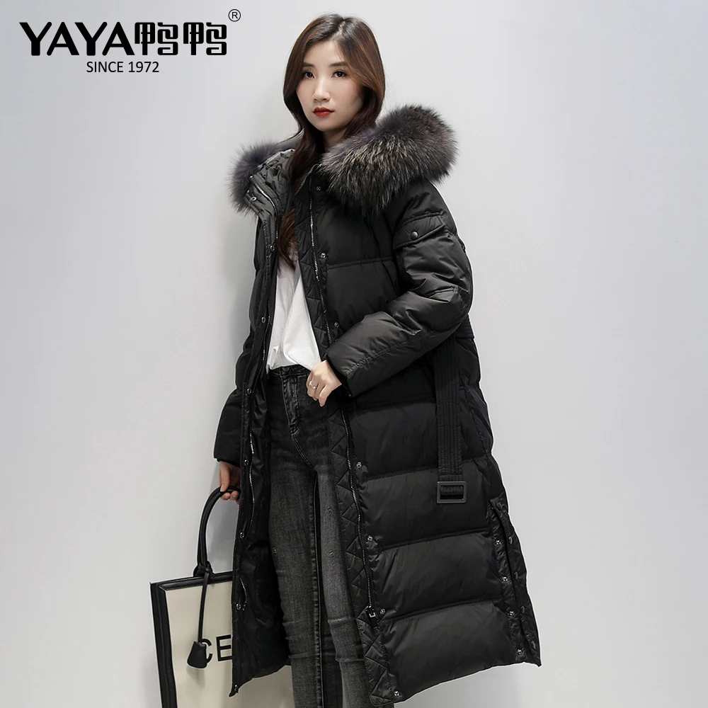 

YAYA 2020 New Women's Hooded Winter Black Down Jacket Extended 90% White Duck Down Raccoon Fur Collar Warm Windproof Clothing