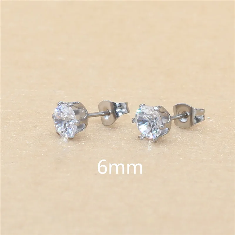 Klassische Ohrstecker aus Edelstahl, weiß, mit AAA-runden weißen Zirkonia-Steinen, 3 mm. – Detail 18
