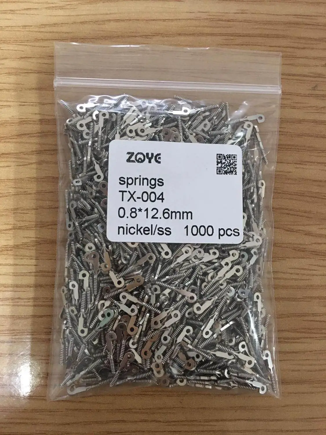 

spring insert for eyeglass TX-004, 2000 pcs pack ,0.8mm thickness,12.7mm length, stainless steel eyeglass replacement part