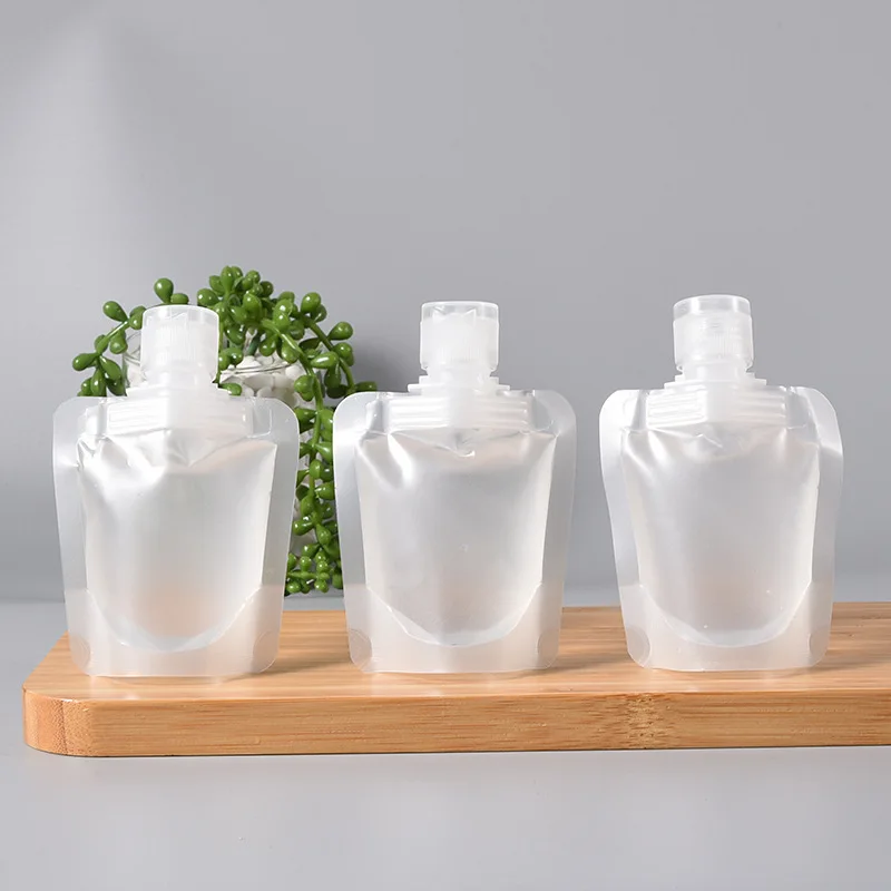 50pcs Transparent Flip Cap Packaging Bag Plastic Stand Up Spout Pouch Spray Cover Portable Travel Makeup Packing Bag