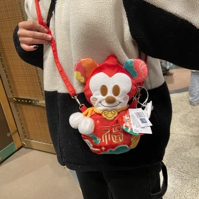 

Shanghai Disney New Year messenger bag Mickey Mouse mobile phone bag plush doll bag Spring Festival Year of the Ox messenger bag