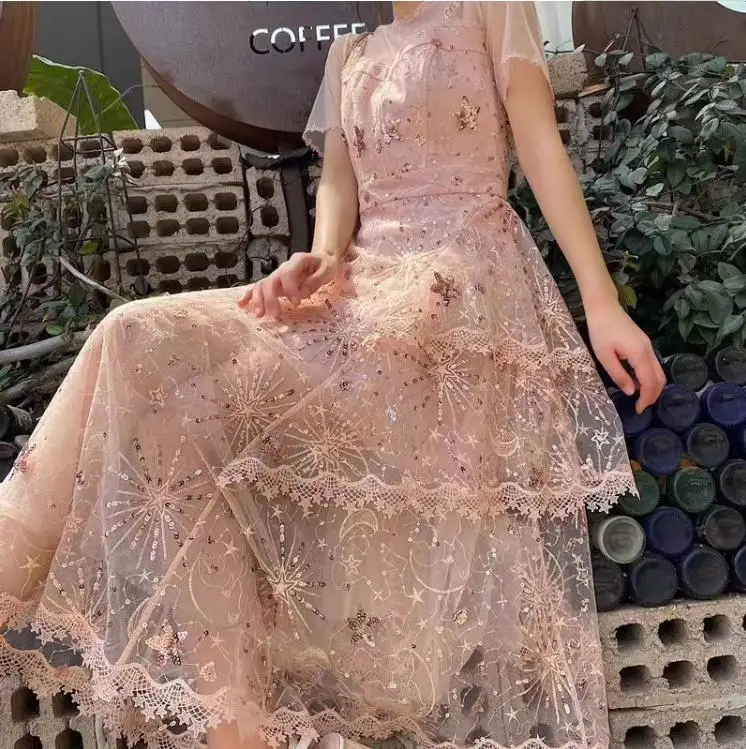 1meter Stars and moon sequined yarn cloth dress see-through sequined dress fashion designer mesh embroidery fabric