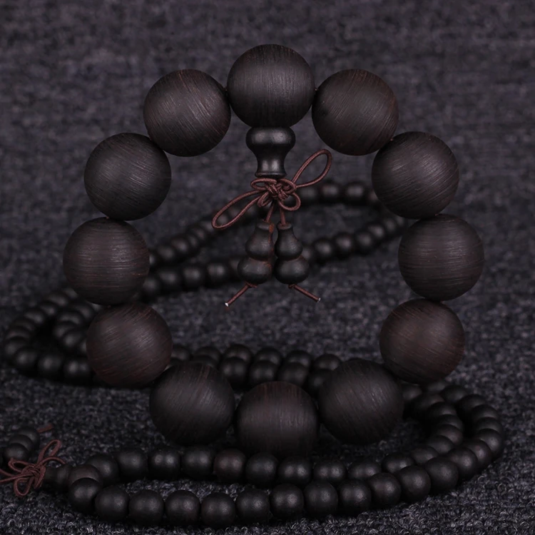 

Hainan Jiangzhen fragrant hand string screw thread technology old material Buddha beads agarwood black oil fragrance bracelet