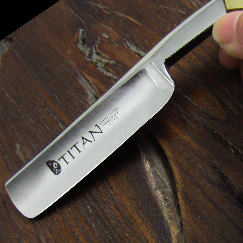 titan old fashioned razor with copper head wood handle