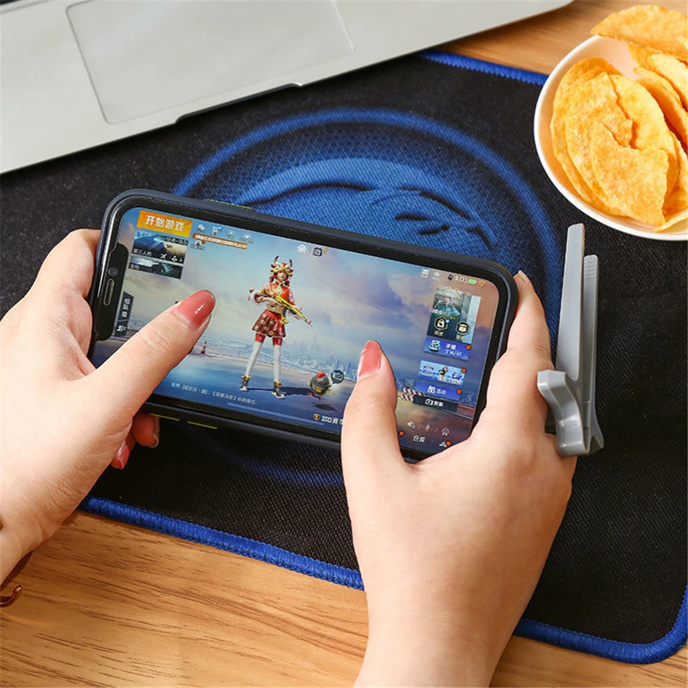 Accesorio asistente perezoso mano teléfono dedo palillos Clip bocadillos jugar juegos