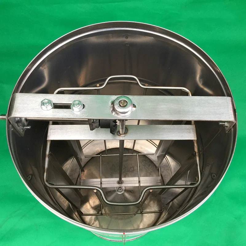 إطار مستخرج العسل اليدوي 2025 من الفولاذ المقاوم للصدأ معدات تربية النحل على شكل قرص العسل.