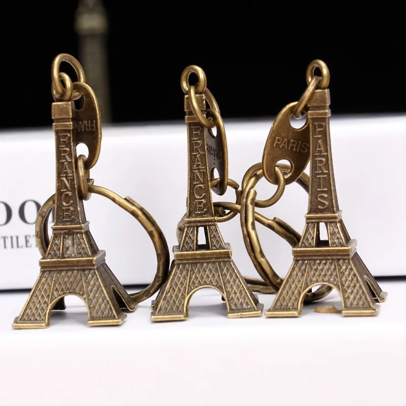 1PC 3สี Eiffel Tower Key Chain พวงกุญแจรถจักรยานยนต์พวงกุญแจความสูงโลหะสร้างสรรค์รุ่น Keyring สำหรับคริสต์มาสของขวัญ