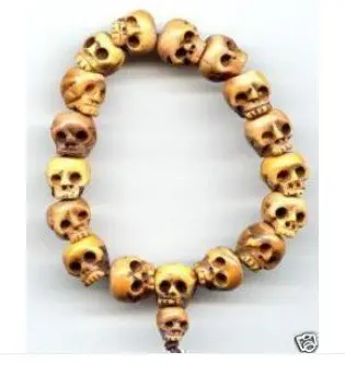 

Tibetan Ox Bone Carved Skull Prayer Bead Bracelet