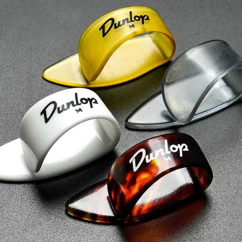 Dunlop     Thumb pick.  Wearing thumb paddles, a variety of colors, thickness 1mm/1.4mm. Play flexibly and get started easily.