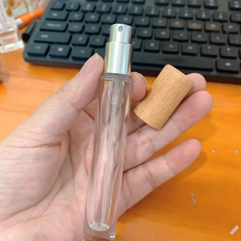 Wholesale 10ML Empty Perfume Bottles Wood Cap Thick Glass Spray Bottles High-grade Air Freshener Containers Packaging