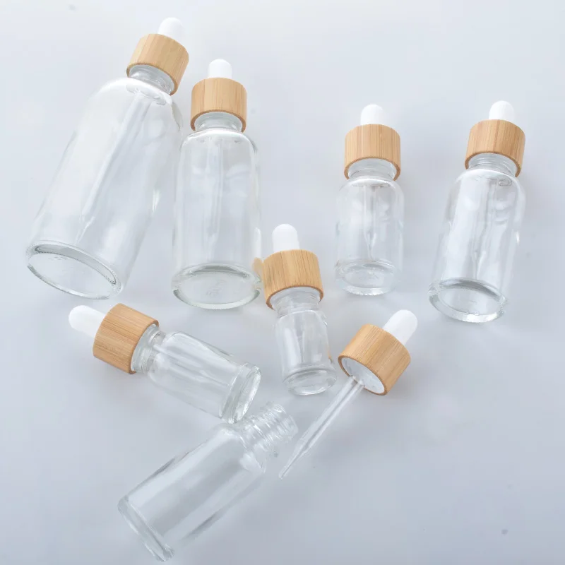 100pcs natural bamboo cap Clear Glass Dropper Bottle Aromatherapy Liquid serum/essential basic massage oil Pipette Refillable