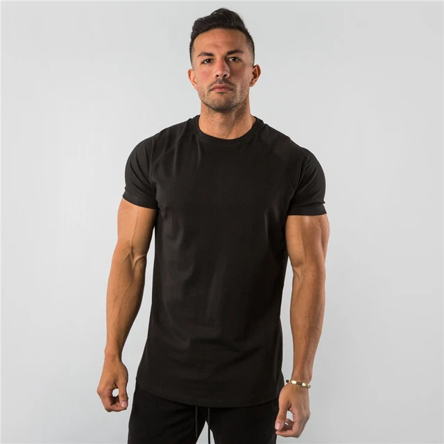 Letnia koszulka z krótkim rękawem z bawełny Mężczyźni Odzież na siłownię Moda Zwykłe obcisłe topy Koszulki Sport Kulturystyka Fitness T shirt Mężczyźni
