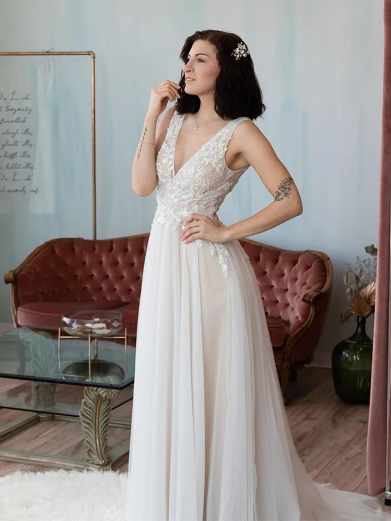 Abito da sposa semplice con scollo a v profondo 2024 Applique in pizzo senza schienale a-line senza maniche eleganti abiti da sposa per le donne Robe De Mariée nuovo