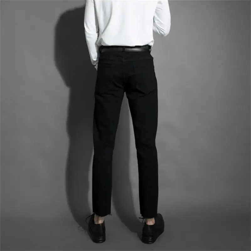 Men's spring and autumn style slim broken jeans Korean trend pencil pants casual pants with edge