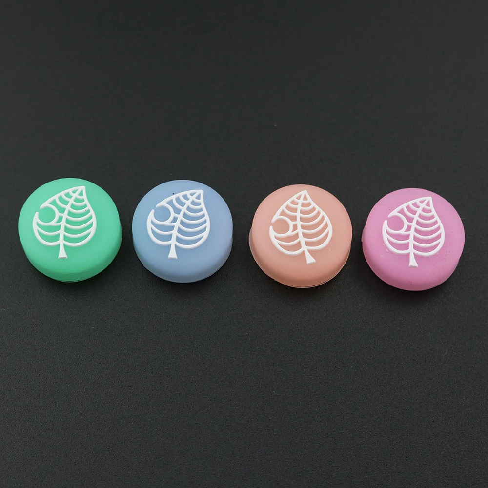 Joystick de silicona con forma de hoja luminosa para cruce de animales, tapas de agarre para pulgar de oso y hoja de árbol para controlador Nintendo Switch Lite