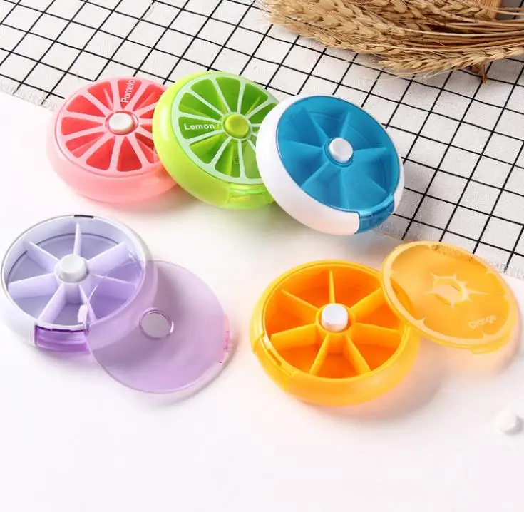 

Portable Round Weekly Rotating Pill Box Travel Pill Case Organizer Medicine Box 7 Day Pill Cutter Tablet Container SN3819