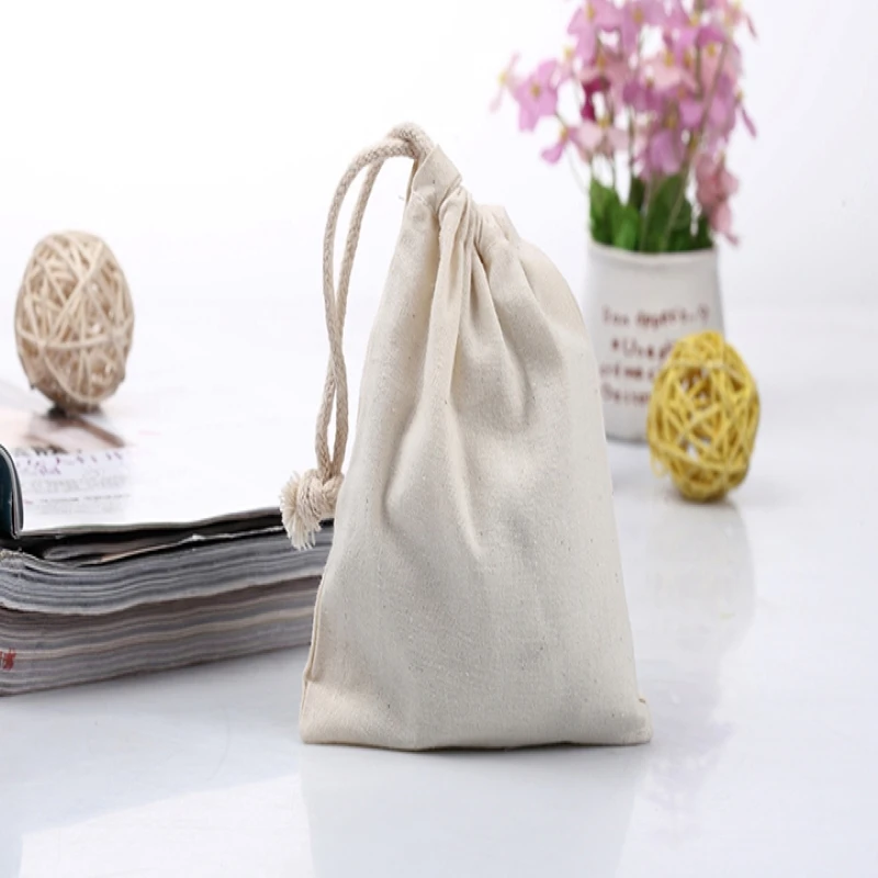 

100pcs/lot free shipping cotton jewelry pouches high quality gift drawstring toiletry makeup packing and storage bags