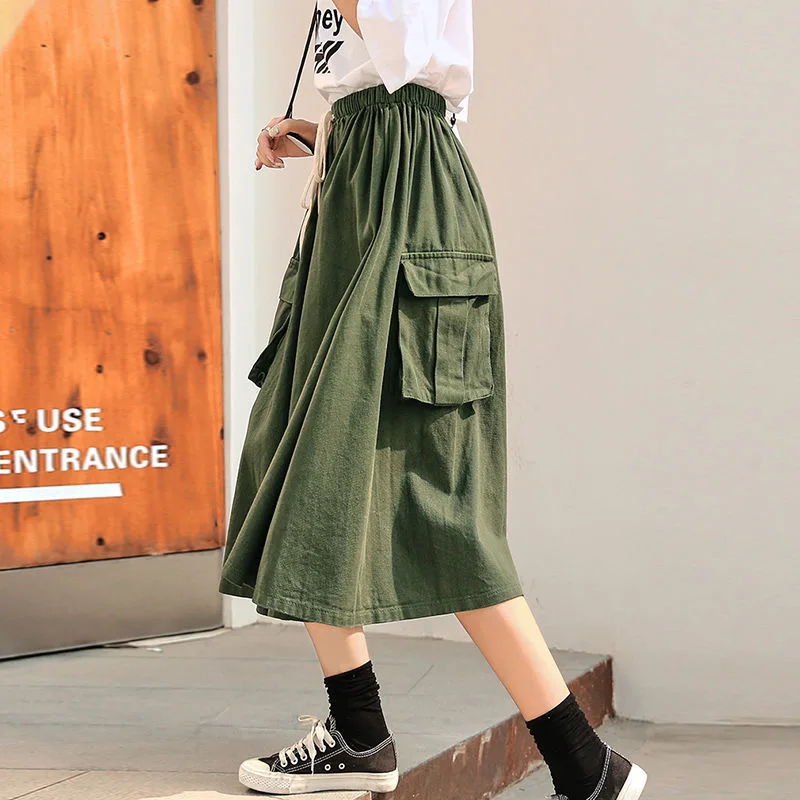 

Harajuku Cargo Skirt Women Loose A-line Pocket Solid Midi Long Green Black Skirt Fashion Korean Hip Hop High Waist Streetwear