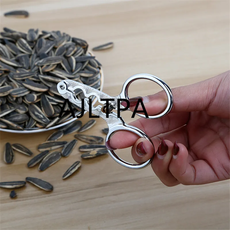 

100pcs/lot Multi-Function Pliers Shell Peeling Pliers Fruit Fine Nuts Pistachio Pine Sheller Alloy Nut Shelling Gadgets CT0245