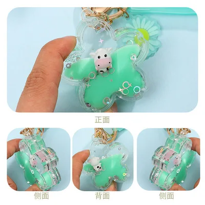 Cartoon into the oil quicksand cherry blossom acrylic keychain cow cute bag pendant catch the doll machine