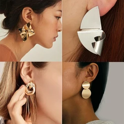 Pendientes colgantes de Metal de Color dorado, pendientes con colgantes de corazón hueco Irregular, pendientes con personalidad geométrica retorcida para mujer