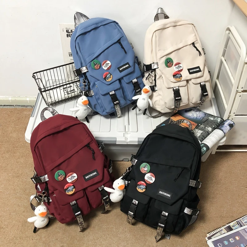 Diagonal Zipper Badge Boy Girl Backpack Double Pocket Bag Couple Version College Student Schoolbag Simple Design Women Rucksack