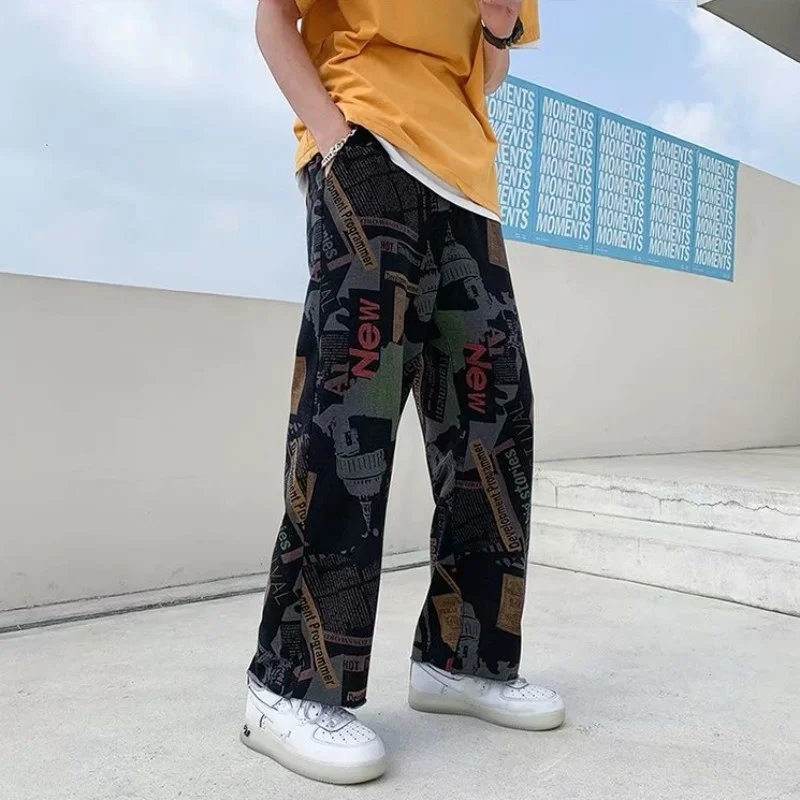 

Hip Men Hop Loose Fit Straight Pants Casual Streetwear Harajuku Graffiti Printed Harem Pants Man Spring Summer Wide Leg Trousers