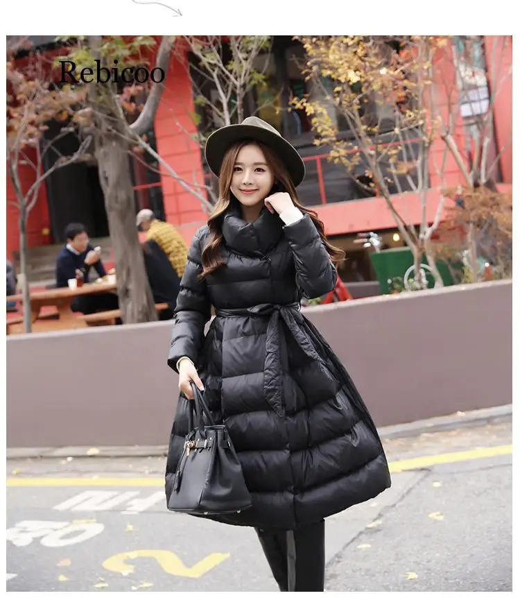 

winter fashion women Coats medium-long cotton-padded jacket Thick lacing waist Large Hem Parka Overcoat