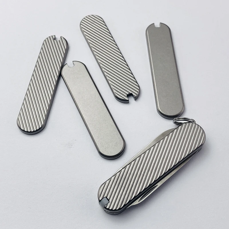 1 par de parches de mango TC4 modificados con Chip de aleación de titanio para fabricación de Material de mango de cuchillo DIY para cuchillo suizo de 58 Mm