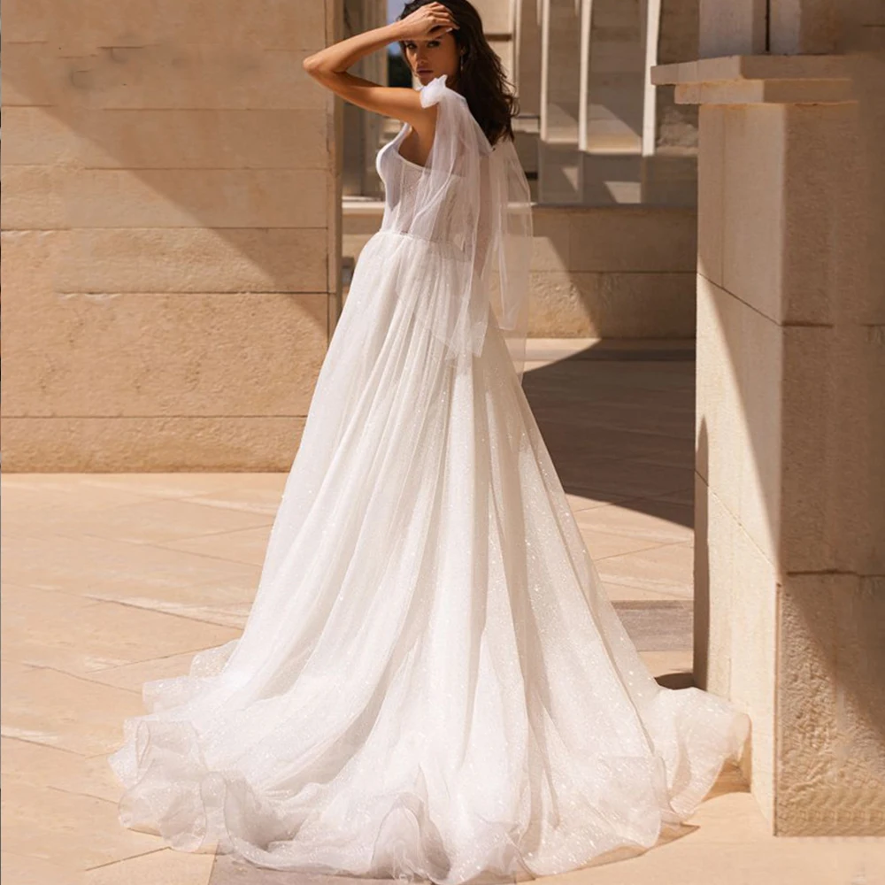 Vestidos de Boda de Princesa personalizados, vestido de novia de tul con purpurina y escote en forma de corazón, cola de barrido, vestido de novia sin mangas con espalda descubierta para mujer 2024