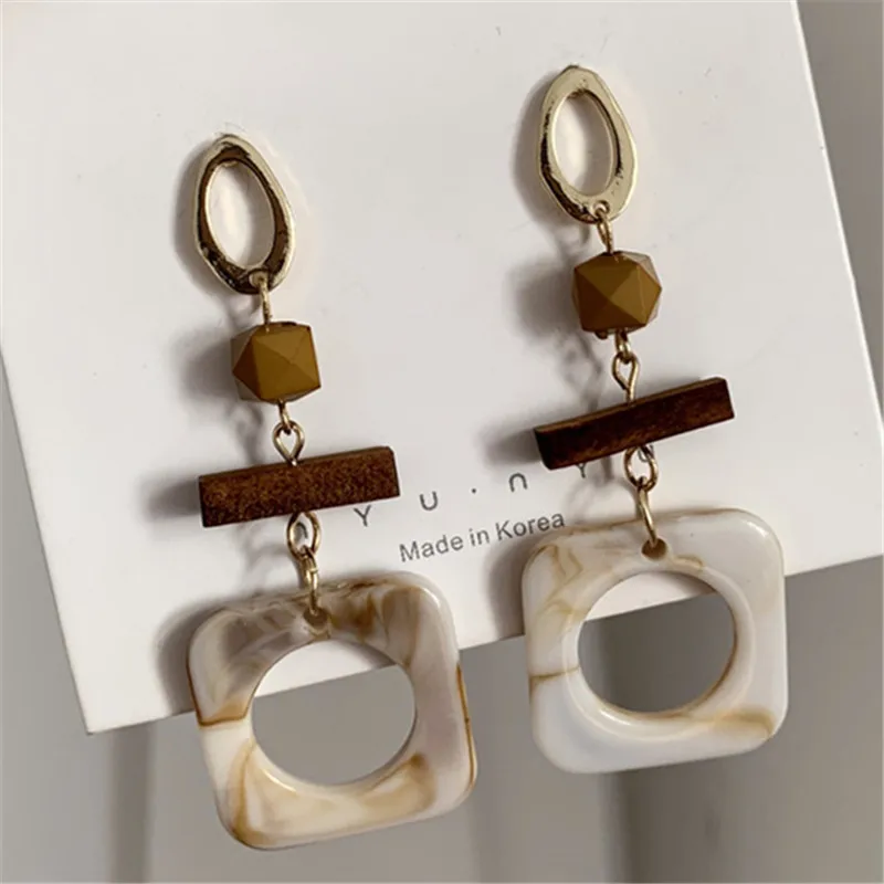 South Korea's temperament style restoring ancient ways show face little joker hollow rectangular geometry resin earrings