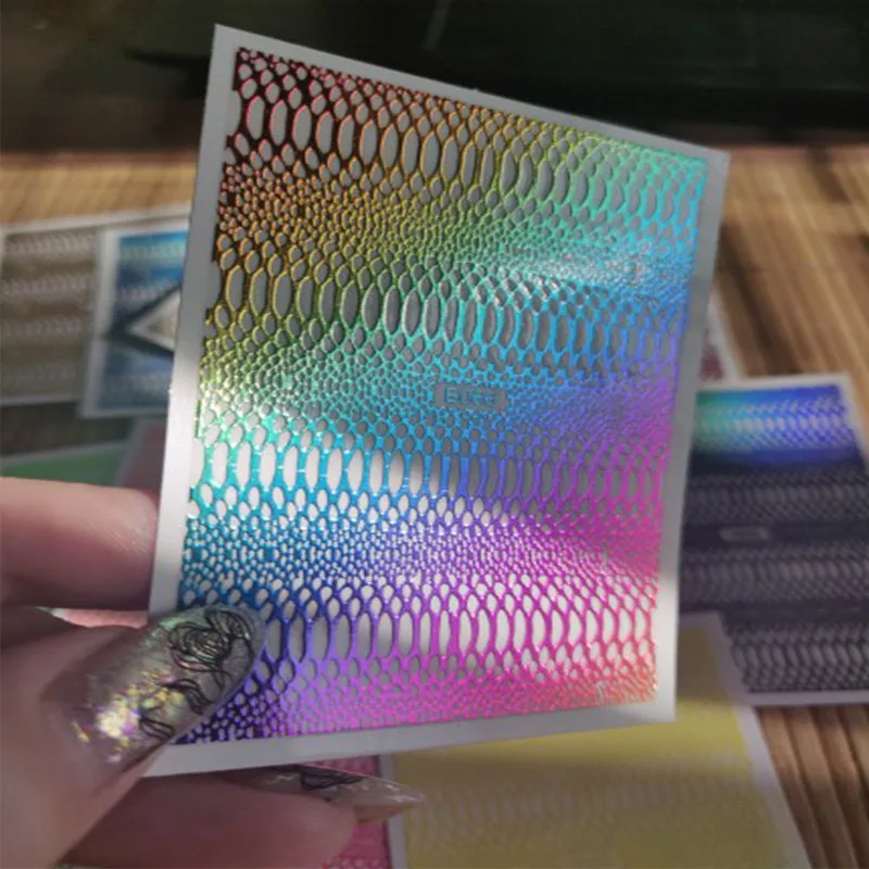 

12 Sheets Holographic Net Nail Art Stickers Snake Grid Pattern Nail Stickers Self Adhesive Net Line DIY Manicure Foil Tips