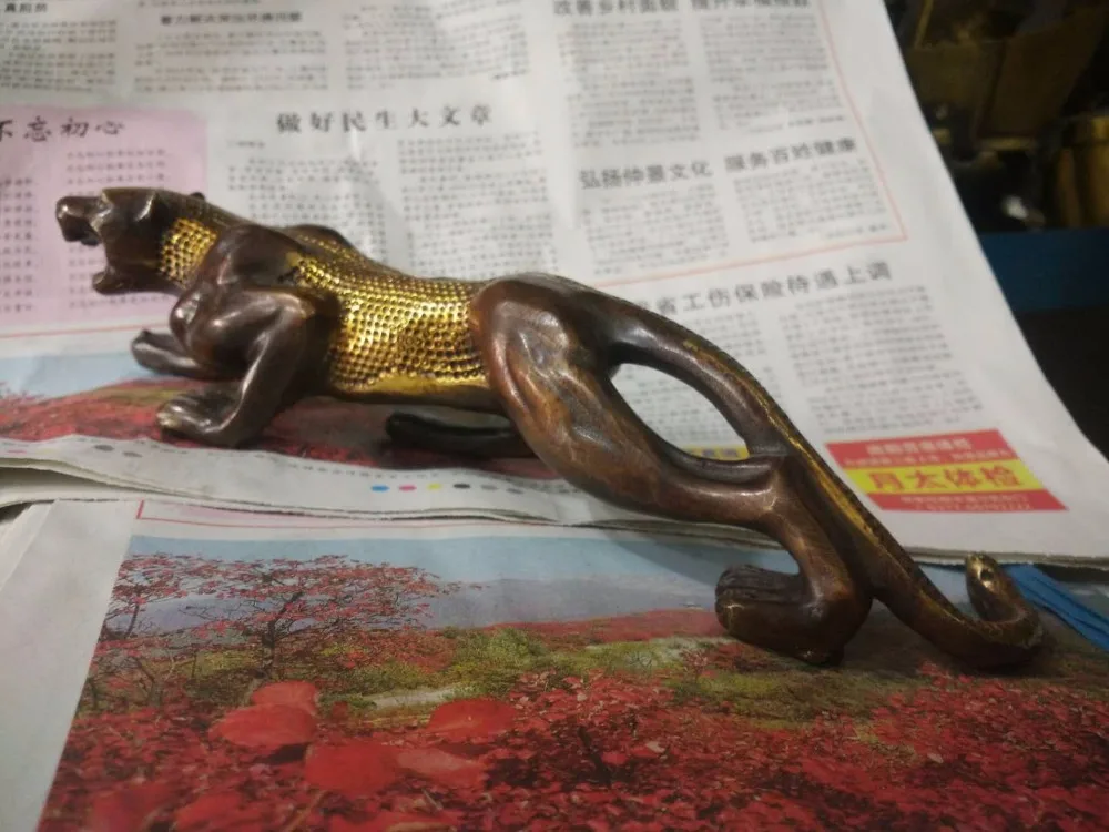 

Exquisite brass crafts in ancient China. Fierce animal, leopard.