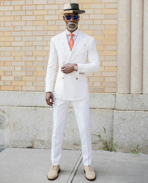 Trajes de novio con sombrero sales