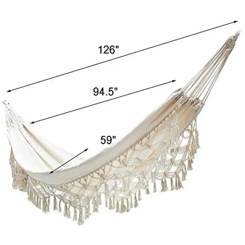 Two person double hammock installed in open living space