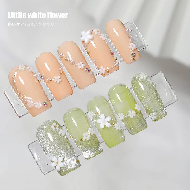 500 Japanese-style five-petal flower small white flower three-dimensional mini ins resin white small flower nail decoration