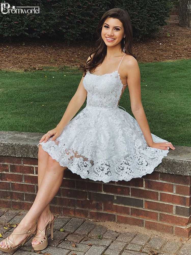 

Cute A-Line White Lace Short Prom Gown Homecoming Dresses 2021 Spaghetti Straps Backless Champagne Graduation Dresses