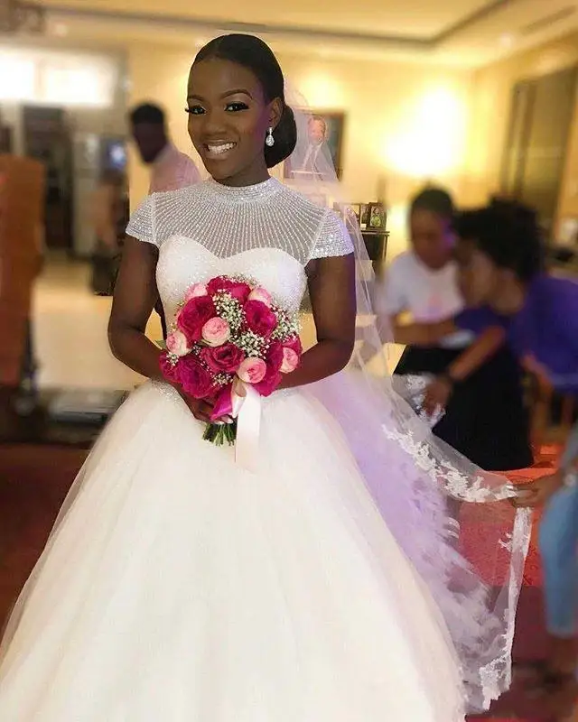 

Luxury Plus Size Wedding Dresses High Neck Cap Sleeves Full Beaded Sequins Open Back African Nigeria Bridal Gowns