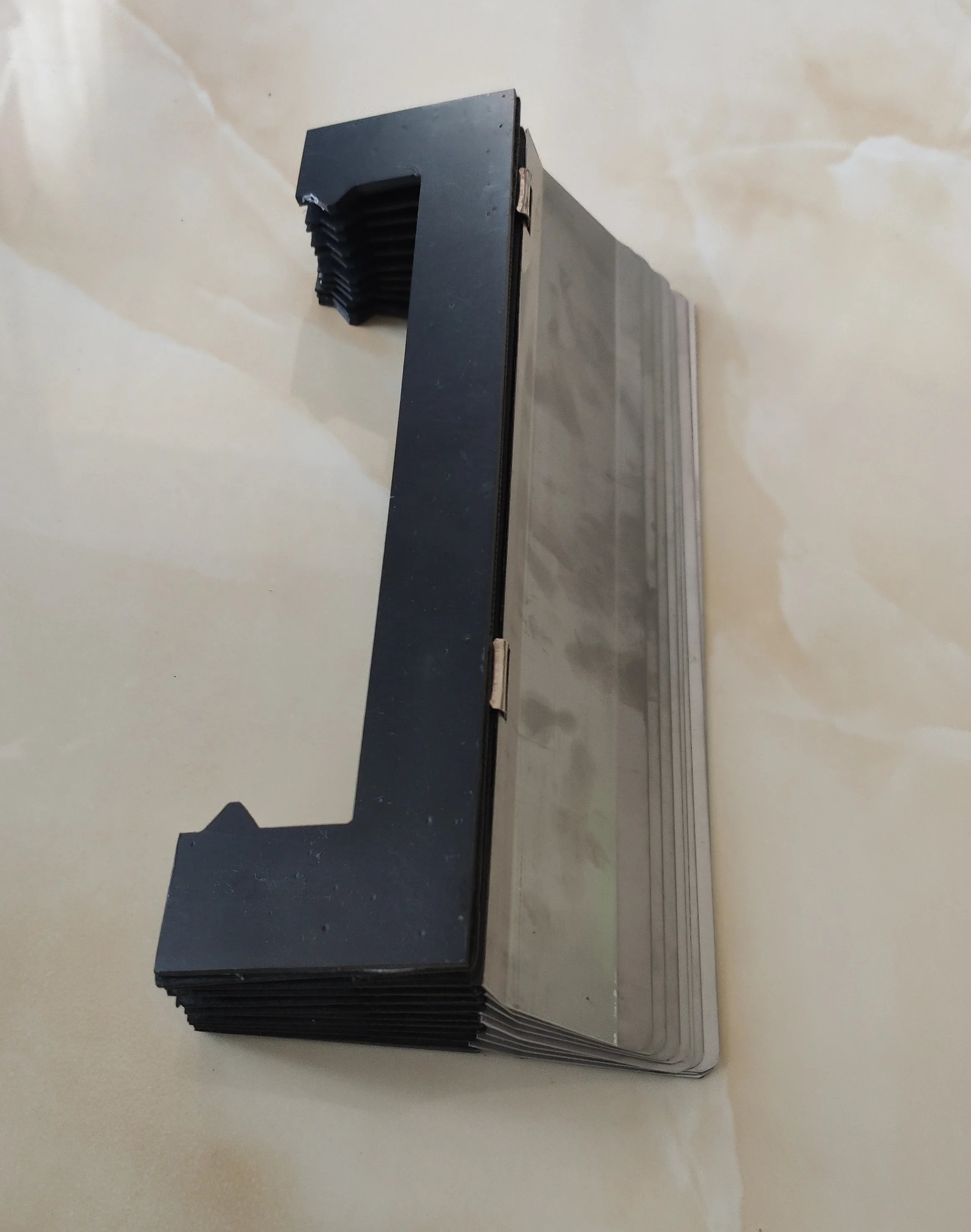 Rotary armour (plates) bellows way cover for guide rail,  Width 200 mm x Height 49 mm x Lmax 230 mm