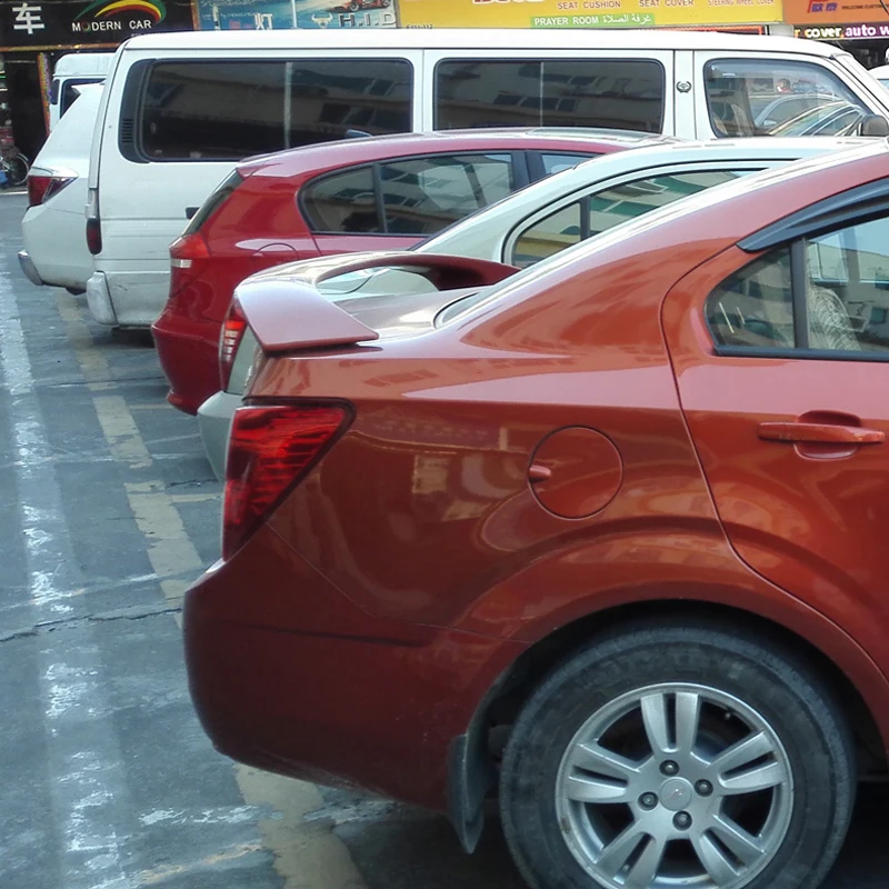 For Aveo Spoiler ABS Material Car Rear Wing Primer Color Rear Spoiler Press the tail For Chevrolet Aveo Spoiler 2010-2015