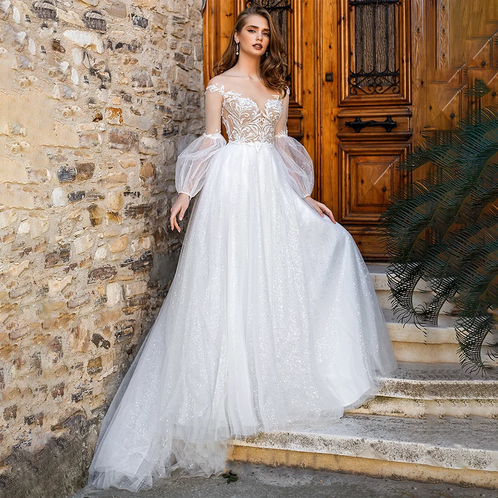 Świecący przeźroczysty tiul długie rękawy suknie ślubne Custom Made Backless perły linia luksusowe duże rozmiary fotografia suknia ślubna