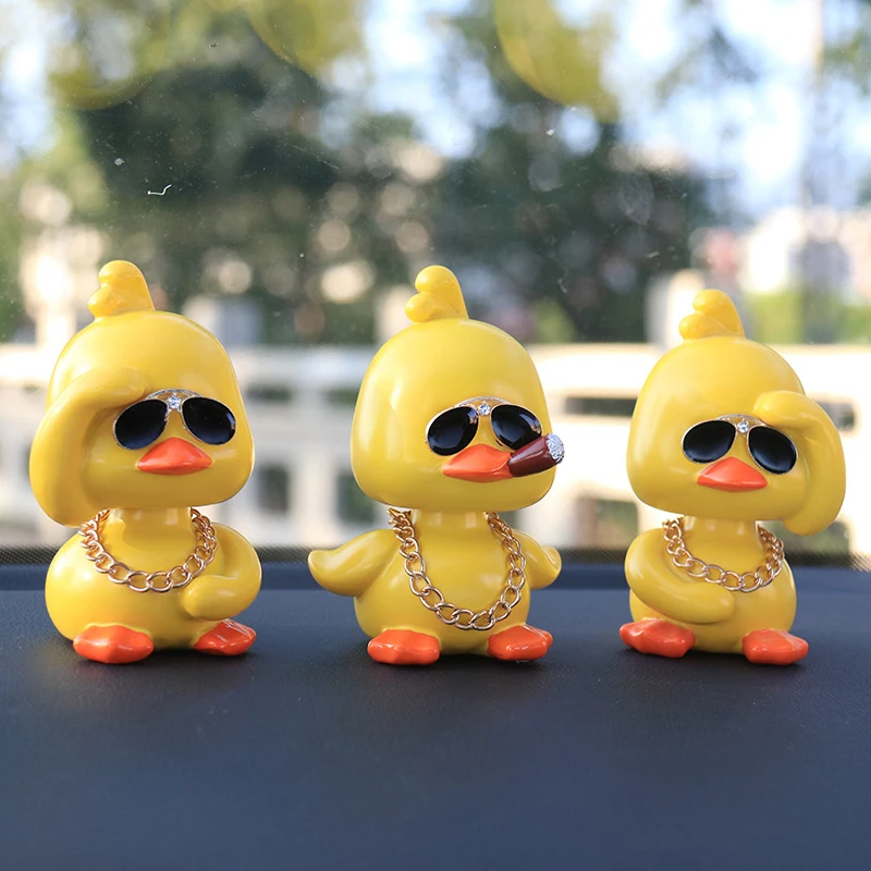 

Little yellow duck car interior decoration ornaments car cute car shaking head doll car creative